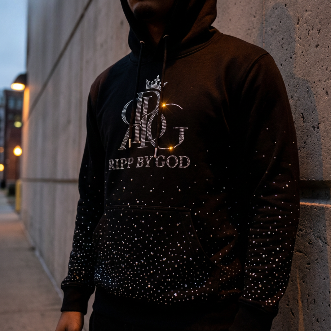 black hoodie with diamond details and 'Ripp by God' logo